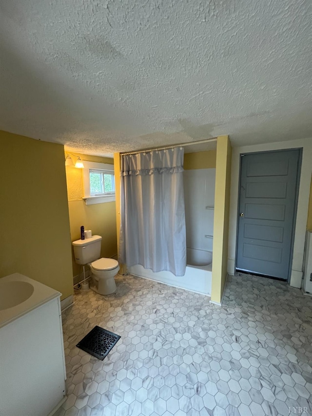 1603 Taylor St, Lynchburg, VA 24504 - bathroom featuring toilet, curtained shower, a textured ceiling, and vanity