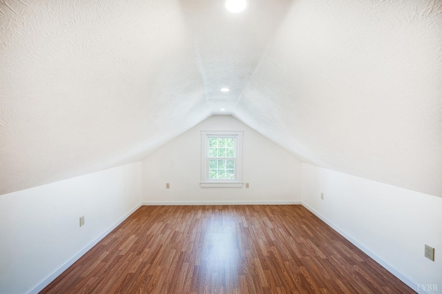 730 Stuart St, Lynchburg, VA 24501 - additional living space with lofted ceiling, wood finished floors, baseboards, and recessed lighting