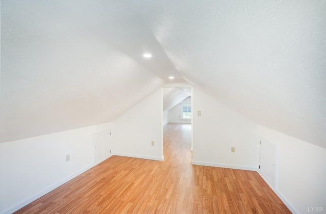 730 Stuart St, Lynchburg, VA 24501 - bonus room featuring light wood-style floors, vaulted ceiling, baseboards, and recessed lighting
