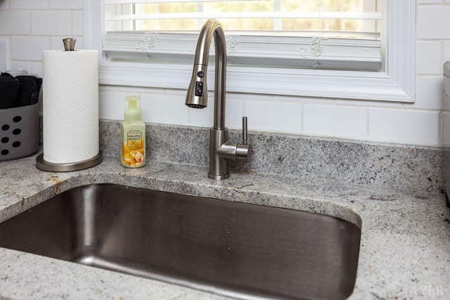 208 Samson Way, Madison Heights, VA 24572 - kitchen view of a sink and decorative backsplash