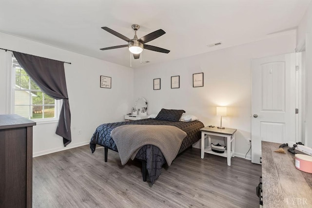 208 Samson Way, Madison Heights, VA 24572 - bedroom with light wood-type flooring, baseboards, and a ceiling fan