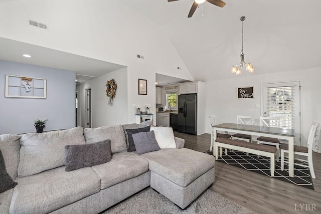 208 Samson Way, Madison Heights, VA 24572 - living area with wood finished floors, a chandelier, high vaulted ceiling, and ceiling fan