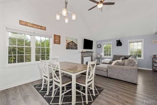 208 Samson Way, Madison Heights, VA 24572 - dining room featuring a ceiling fan, wood finished floors, baseboards, high vaulted ceiling, and a fireplace