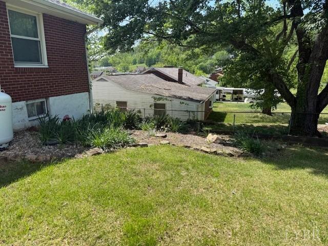 view of yard featuring fence