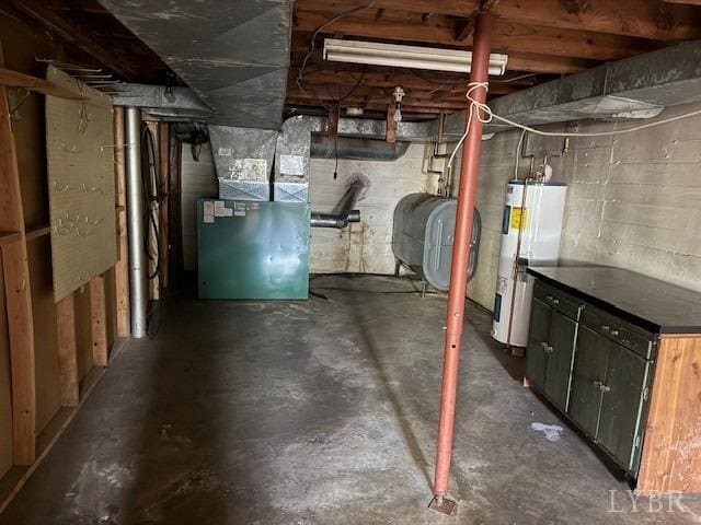 unfinished basement with heating unit, heating fuel, and electric water heater