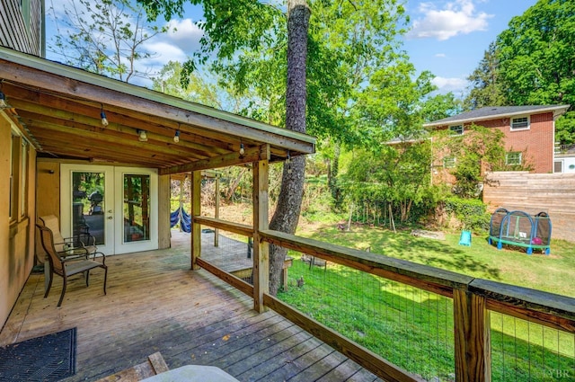 4205 Tremont, Lynchburg, VA 24502 - deck with french doors, a lawn, and a trampoline