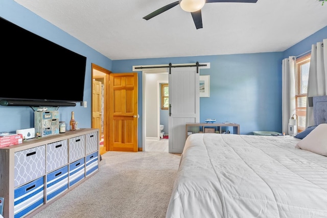 95 Rhage Ln, Lynchburg, VA 24504 - carpeted bedroom featuring a barn door and a ceiling fan