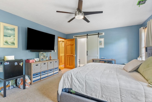 95 Rhage Ln, Lynchburg, VA 24504 - bedroom with a barn door, carpet flooring, and ceiling fan