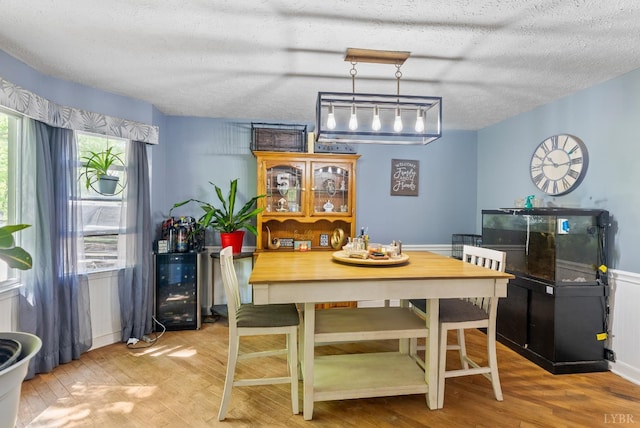 95 Rhage Ln, Lynchburg, VA 24504 - dining space with hardwood / wood-style flooring, beverage cooler, and a textured ceiling