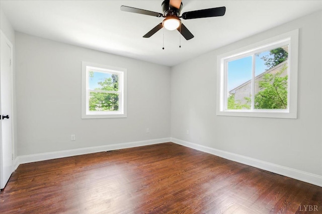 3882 Peakland Pl, Lynchburg, VA 24503 - unfurnished room with healthy amount of natural light, baseboards, and wood finished floors