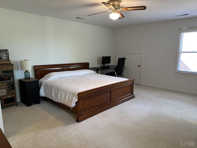 69 Gough Rd, Rustburg, VA 24588 - bedroom featuring light colored carpet, an office area, ceiling fan, and baseboards