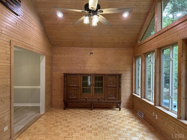 69 Gough Rd, Rustburg, VA 24588 - unfurnished living room with vaulted ceiling, a ceiling fan, wood walls, wood ceiling, and parquet floors