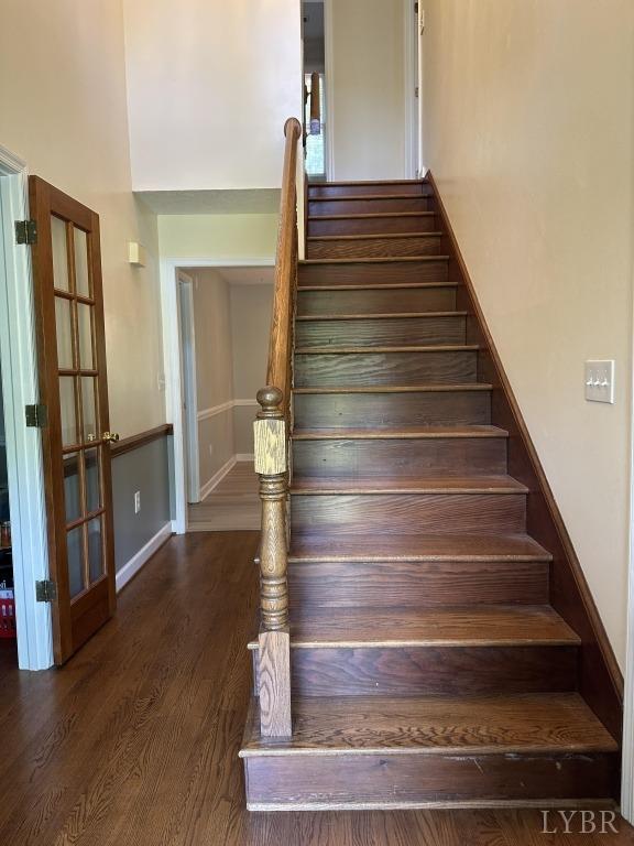 69 Gough Rd, Rustburg, VA 24588 - stairway with wood finished floors and baseboards