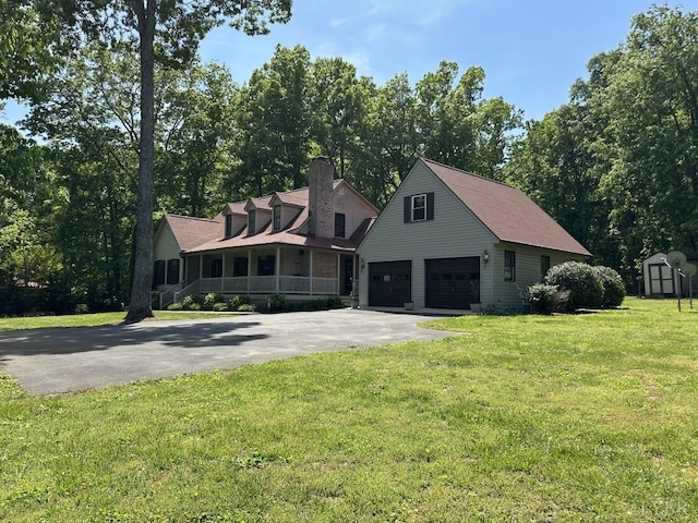 69 Gough Rd, Rustburg, VA 24588 - cape cod-style house featuring an outdoor structure, a front lawn, a chimney, a detached garage, and a storage shed