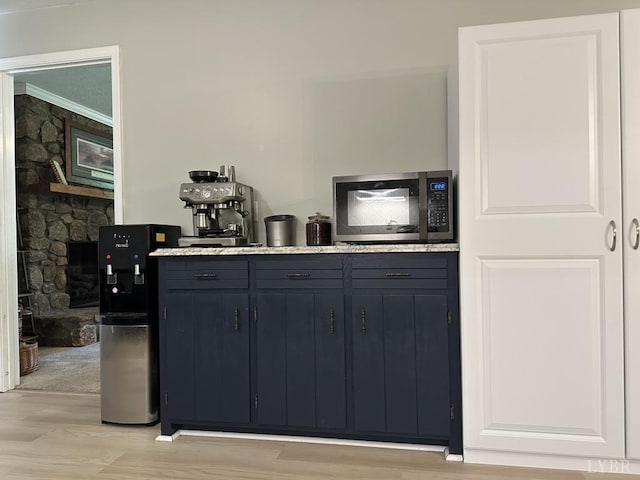 69 Gough Rd, Rustburg, VA 24588 - kitchen with stainless steel microwave and light wood finished floors