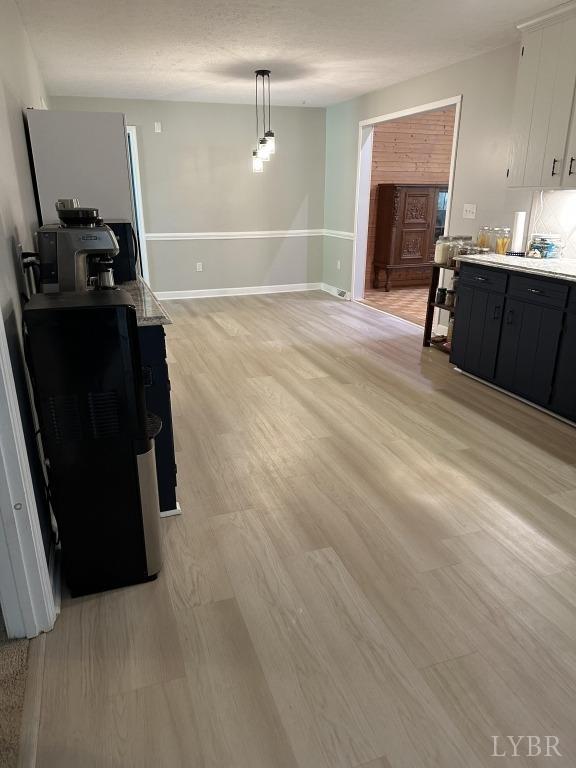 69 Gough Rd, Rustburg, VA 24588 - living room featuring light wood-style flooring and baseboards