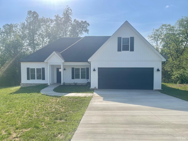 1051 Wills Way, Forest, VA 24551 - view of front of property featuring driveway, a front yard, and a garage