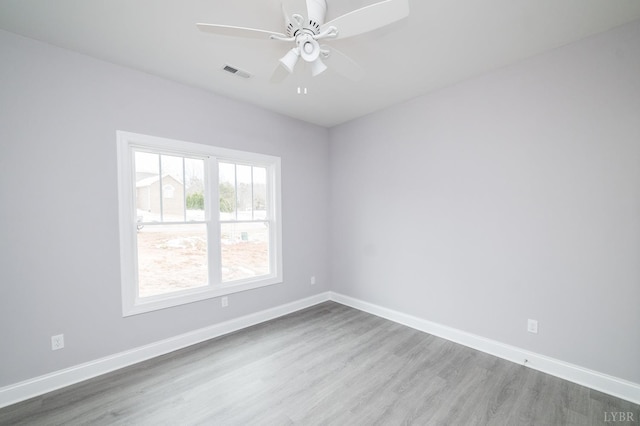 1051 Wills Way, Forest, VA 24551 - spare room featuring wood finished floors, ceiling fan, and baseboards