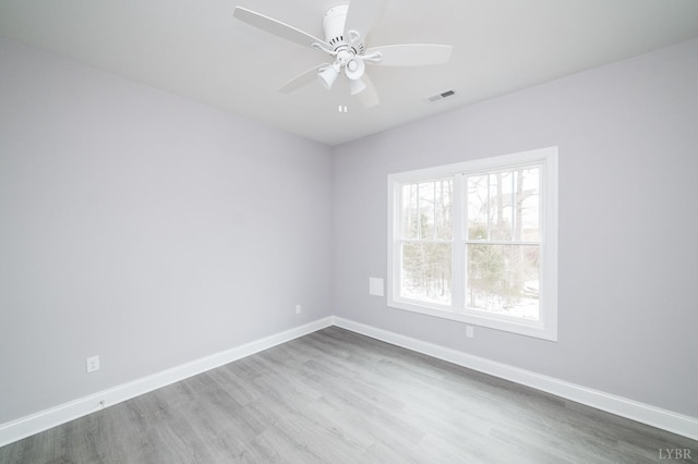 1051 Wills Way, Forest, VA 24551 - empty room with dark wood-type flooring, a ceiling fan, and baseboards
