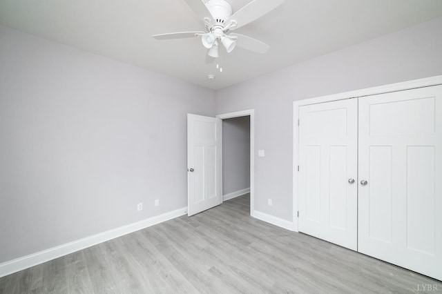 1051 Wills Way, Forest, VA 24551 - unfurnished bedroom with wood finished floors, baseboards, a closet, and ceiling fan