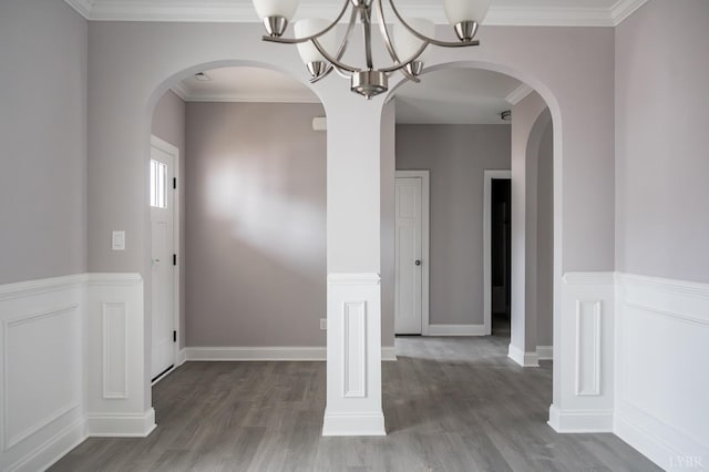 1051 Wills Way, Forest, VA 24551 - empty room with wood finished floors, a chandelier, and ornamental molding