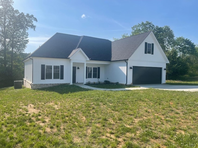 1051 Wills Way, Forest, VA 24551 - modern farmhouse featuring an attached garage, driveway, central air condition unit, and a front yard