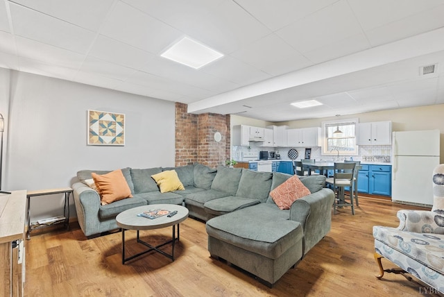 206 Simsbury Ln, Forest, VA 24551 - living room with light wood-type flooring and a drop ceiling