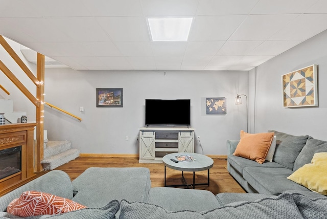 206 Simsbury Ln, Forest, VA 24551 - living area with wood finished floors, stairs, baseboards, and a paneled ceiling