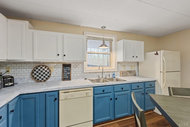 206 Simsbury Ln, Forest, VA 24551 - kitchen with dishwasher, blue cabinets, a sink, white cabinetry, and dark wood-style flooring