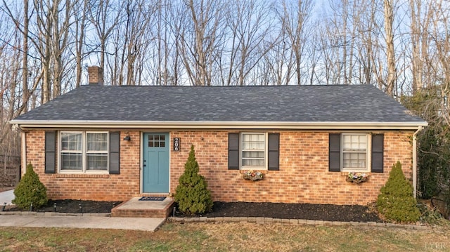206 Simsbury Ln, Forest, VA 24551 - view of front of home with a chimney, brick siding, and a shingled roof