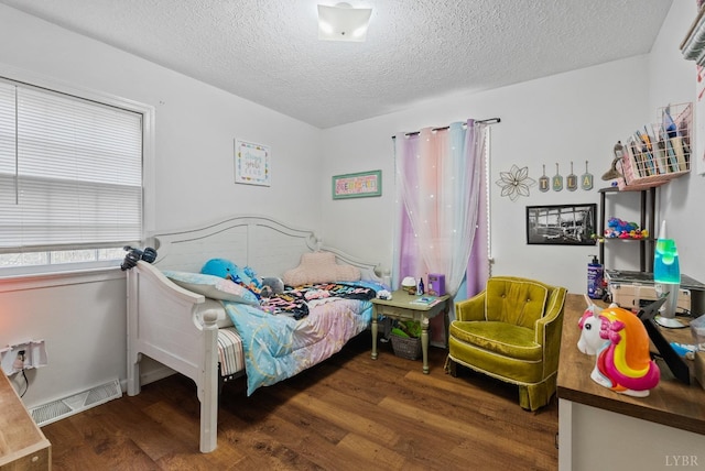 206 Simsbury Ln, Forest, VA 24551 - bedroom featuring wood finished floors and a textured ceiling