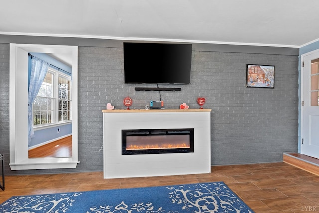 2637 Chilton Rd, Appomattox, VA 24522 - detailed view of a glass covered fireplace, wood finished floors, and ornamental molding