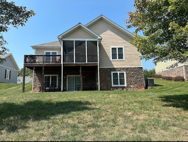 1057 Barrow Hills Dr, Moneta, VA 24104 - back of property featuring a lawn, a sunroom, stone siding, and central AC