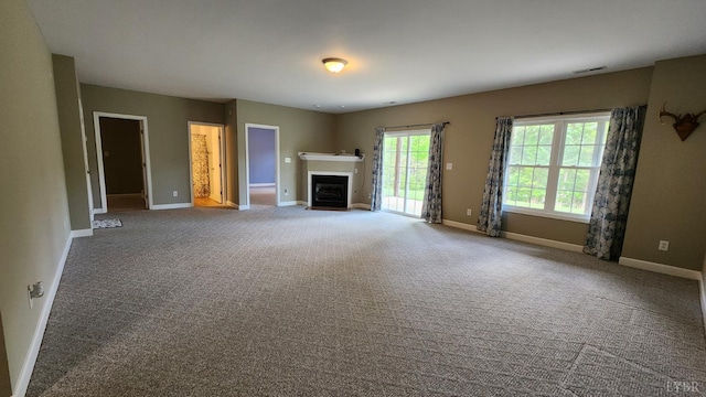 1057 Barrow Hills Dr, Moneta, VA 24104 - unfurnished living room featuring baseboards, carpet floors, and a fireplace