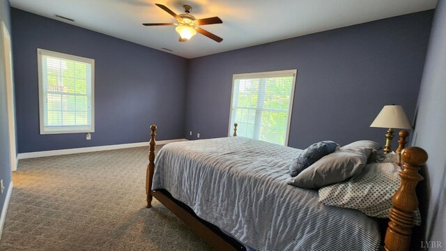 1057 Barrow Hills Dr, Moneta, VA 24104 - carpeted bedroom with baseboards and ceiling fan