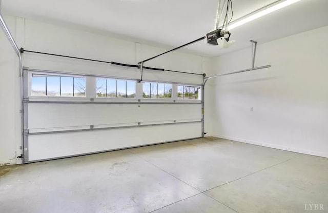 1057 Barrow Hills Dr, Moneta, VA 24104 - garage with a garage door opener and baseboards