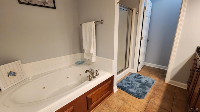 1057 Barrow Hills Dr, Moneta, VA 24104 - bathroom featuring a shower stall, a whirlpool tub, vanity, and baseboards