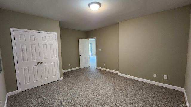 1057 Barrow Hills Dr, Moneta, VA 24104 - unfurnished bedroom featuring carpet flooring, baseboards, and a closet