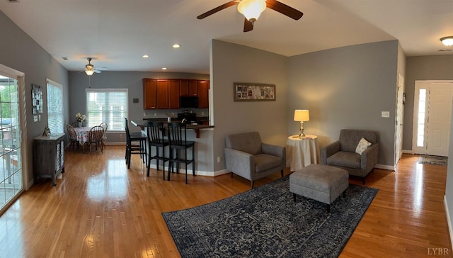 1057 Barrow Hills Dr, Moneta, VA 24104 - living area featuring a ceiling fan, baseboards, light wood-type flooring, and recessed lighting