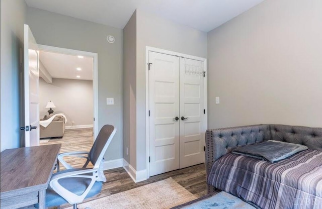 3008 Hill St Unit 313, Lynchburg, VA 24501 - bedroom featuring wood finished floors, baseboards, and a closet