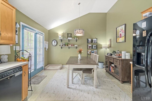 2098 Sunburst Rd, Evington, VA 24550 - kitchen with black appliances, lofted ceiling, pendant lighting, and light countertops