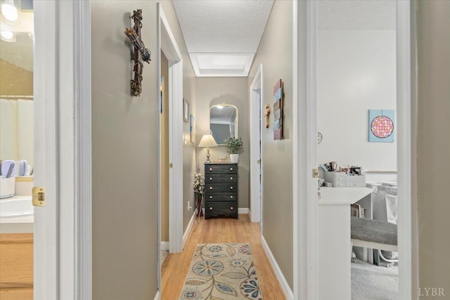 2098 Sunburst Rd, Evington, VA 24550 - hall featuring light wood-style flooring and a textured ceiling