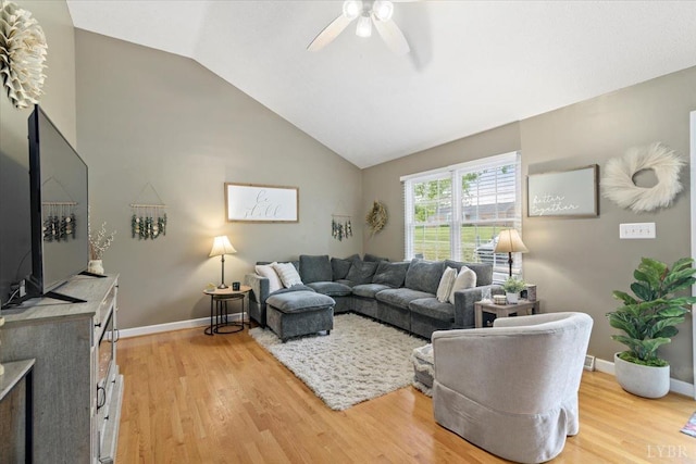 2098 Sunburst Rd, Evington, VA 24550 - living room with light wood-style floors, ceiling fan, lofted ceiling, and baseboards