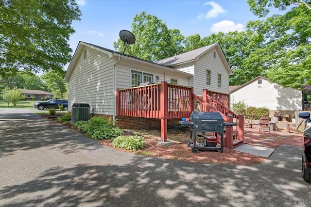 2098 Sunburst Rd, Evington, VA 24550 - view of side of home with a wooden deck and central AC