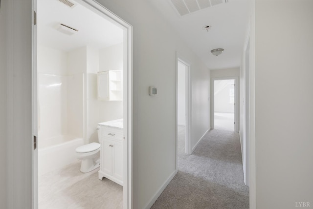 302 Spring Lake Rd, Forest, VA 24551 - hallway with visible vents, baseboards, and light carpet