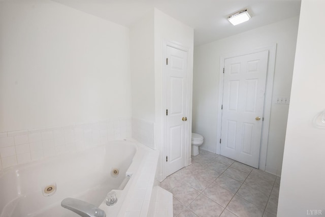 302 Spring Lake Rd, Forest, VA 24551 - bathroom featuring toilet, tile patterned floors, and a jetted tub