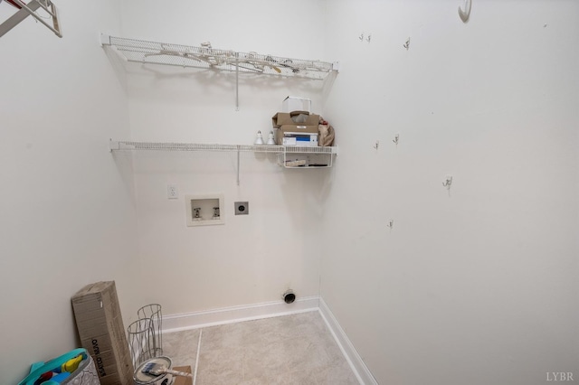 302 Spring Lake Rd, Forest, VA 24551 - laundry area featuring light tile patterned flooring, electric dryer hookup, baseboards, and laundry area