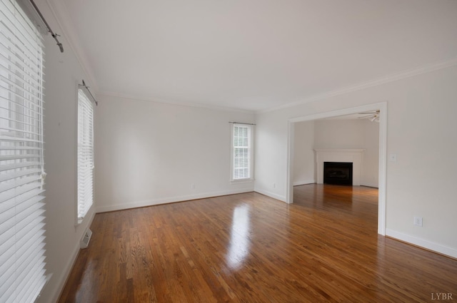 528 Lady Slipper Ln, Lynchburg, VA 24502 - unfurnished living room featuring crown molding, a fireplace, and wood finished floors