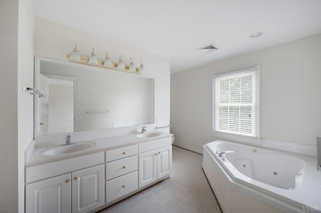 528 Lady Slipper Ln, Lynchburg, VA 24502 - full bathroom featuring double vanity, a jetted tub, and tile patterned floors