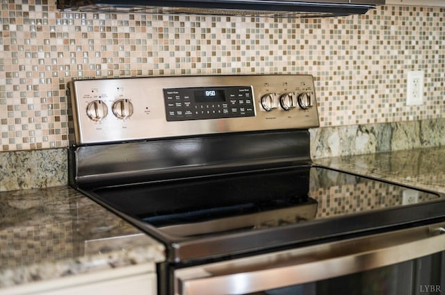 528 Lady Slipper Ln, Lynchburg, VA 24502 - kitchen view of electric range and tasteful backsplash